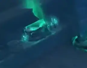 A glowing coffin at the edge of Nek’zali’s arena signals incoming adds
